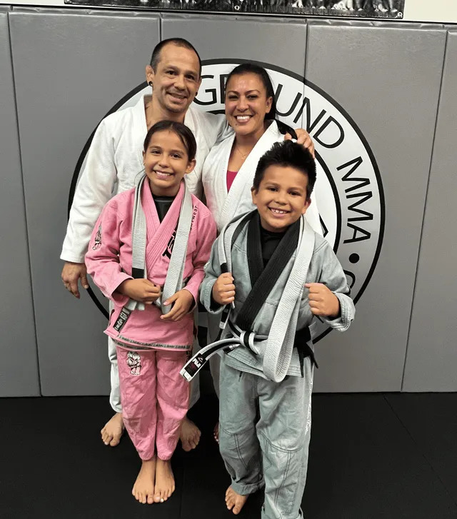 A family training together at Proving Ground MMA
